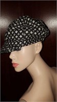 Ladies black and white cap. Reg $24