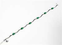Sterling silver 7.5" emerald and diamond bracelet