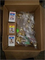 Box of plumbing fittings and gauges