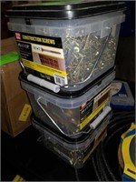 Assorted tubs of screws