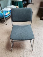 Steel framed cloth covered chair