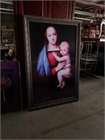 Large picture of a woman holding a baby