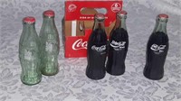 5 Collector Coke Bottles in case
