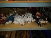 Collection of 7 dolls and dresses