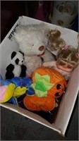 Box of stuffies and doll