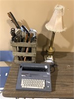 LAMP, TYPEWRITER AND BASKET FULL OF MISC