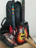 2 gaming guitars with games