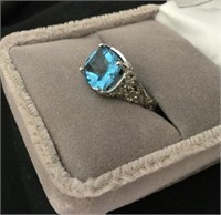 3CT BLUE TOPAZ RING W/ .10CT TDW IN SIZE 5 1/2