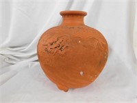 Clay three footed pottery piece, dragon design,
