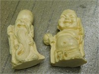 Two carved bone figures