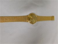 Tag said Gold Coin Wristwatch, not sure how it