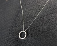 14K .20CT CIRCLE PENDANT DIAMOND IN WG