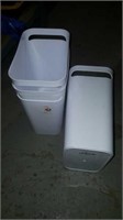 3 white small rect garbage cans