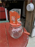 Sweet vintage Hazel Atlas glass and metal grinder