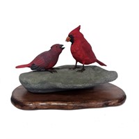 Tony Bendig's Male Cardinal Feeding Young Carving