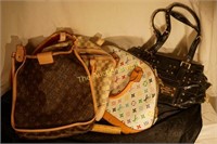 4 Designer bags     Gucci,  2 Louis Vitton , Giane