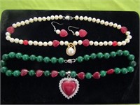 2 Necklaces 1 is Simulated Pearl and Red Beads