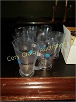 8 Plastic Pitchers 
With Advertising