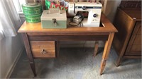 Jenner’s sewing machine, table, and supplies