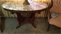 Early Victorian mahogany marble top oval table