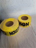 two rolls of caution tape