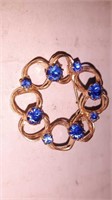 Broach with blue jewels