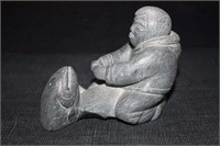 INUIT CARVING OF MAN CATCHING FISH