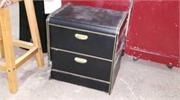 Black nightstand with gold trim