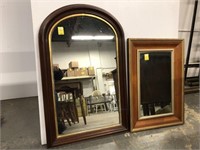 Two unmatched antique wood wall mirrors