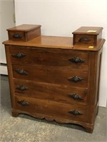 Antique dresser with carved drawer pulls