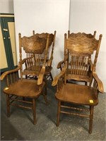Four pressed back arm chairs