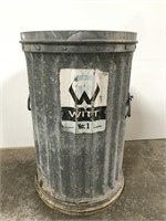 Old galvanized metal weighted bottom trash can
