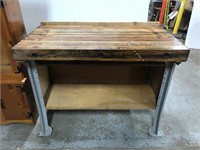 Butcher block table on industrial metal base