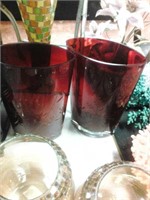 A pair of red Decor vases
