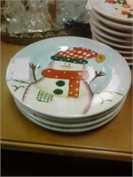 Four snowman plates