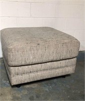 Large Grey Upholstered Ottoman on wheels