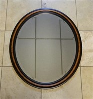 Wood Framed Oval Beveled Mirror.