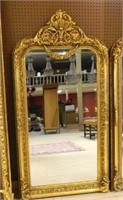 Ornate Gilt Framed Beveled Mirror.