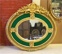 Shell Crowned Oval Gilt Mirror.