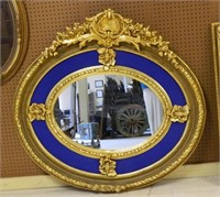 Oval Shell Crowned Gilt Framed Mirror.