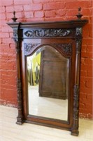 Carved Mahogany Framed Beveled Mirror.