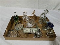 A variety of glass decorative paperweights