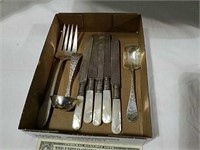 Pearl handled knives, serving fork and spoons