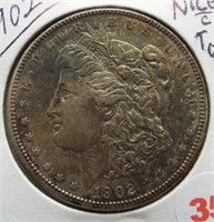 1902 Morgan Silver Dollar. Nice - Toning.