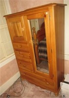 Pine armoire with four drawers, two doors with