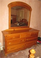 Pine seven drawer dresser with mirror. Measures