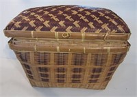 Large wicker basket with hinged lid. Measures 17"