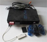 PS2 with cords, controller and memory sticks.