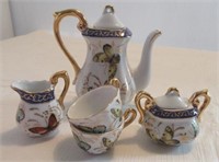 Miniature tea set including teapot, creamer,