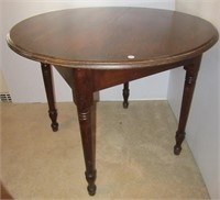 Vintage wood round table. Measures 29" high x 35"
